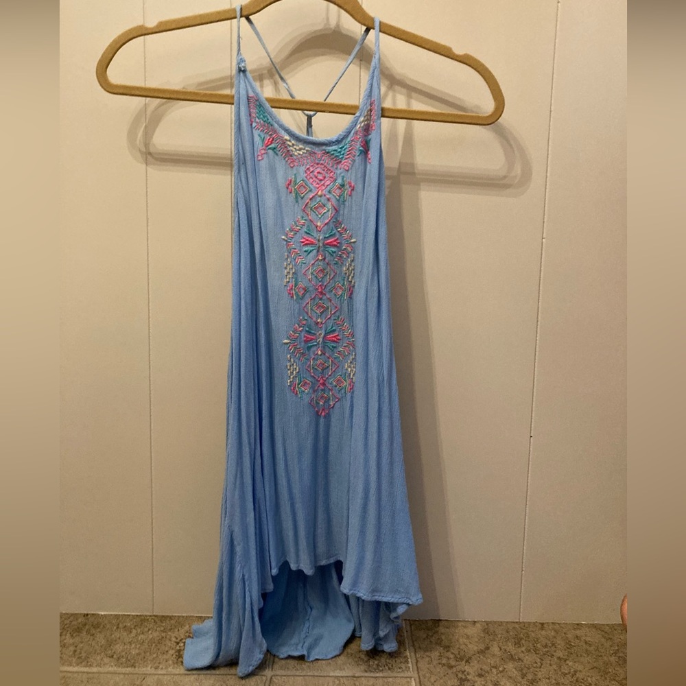 Truth branded low back tank top size large. Light blue and very flowy.